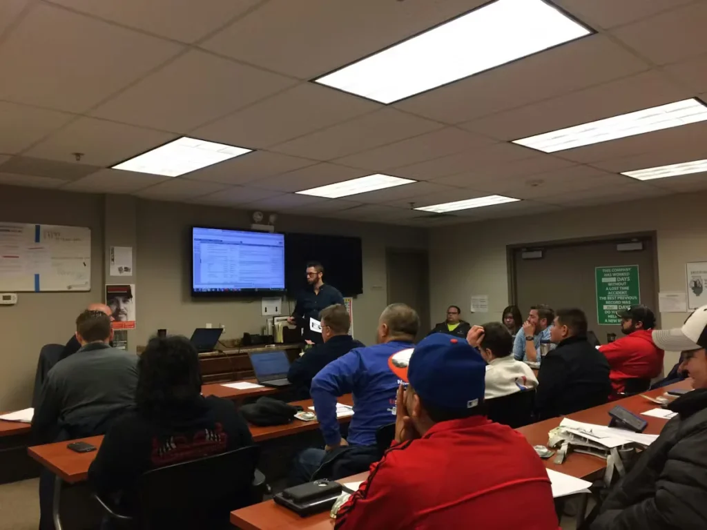 Painters USA team participating in an internal training session focused on commercial and industrial painting best practices and client satisfaction.