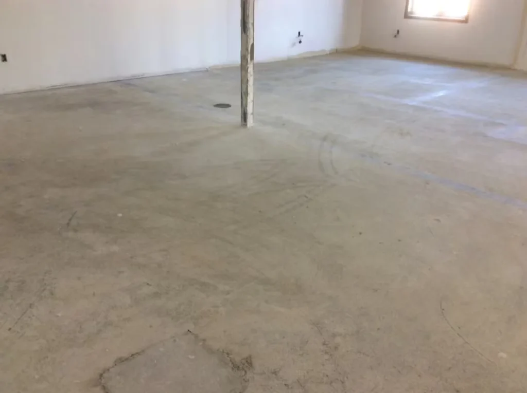 Polished concrete flooring in a commercial interior space prior to finishing.