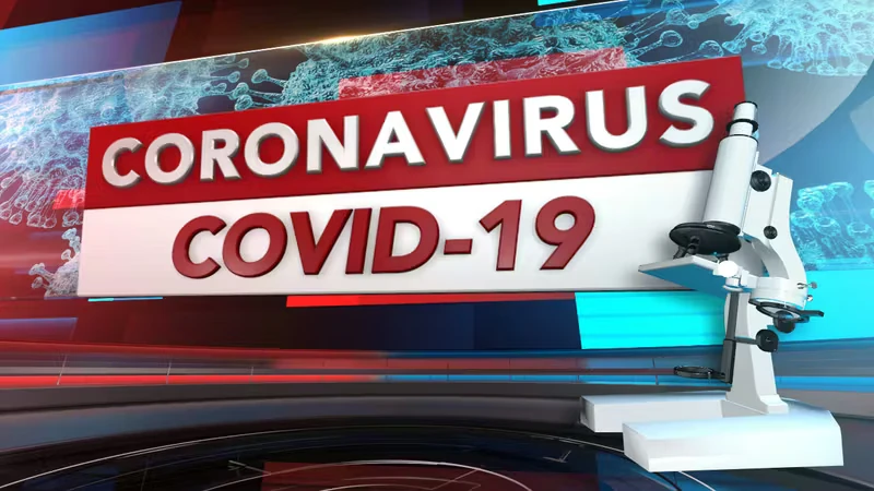 TV-style graphic reading “CORONAVIRUS COVID-19” in large red and white text over a blue background with virus imagery, alongside an illustration of a microscope.