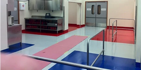 Thermal shock resistant flooring—industrial food processing area with brightly colored coated floors designed to withstand rapid temperature changes.