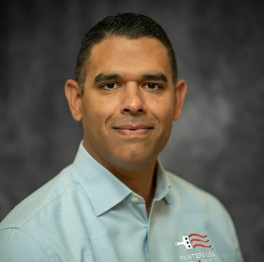 Portrait of Leo Almanza, Senior Vice President of Operations for Painters USA
